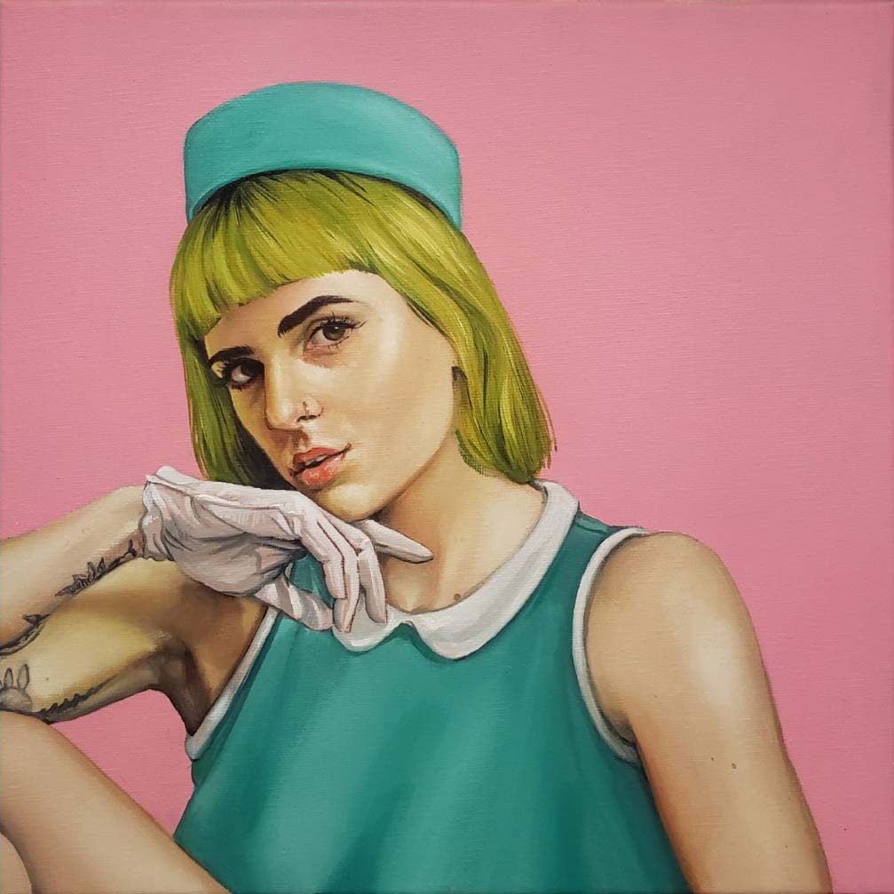portrait of young woman in sleeveless green and white top and a green hat with white glove