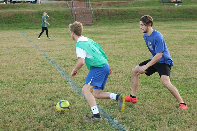 students playing intramural soccer