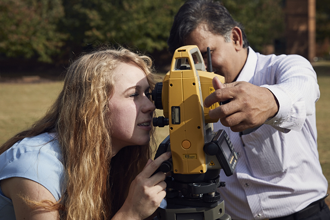 GIS student and teacher in the field.