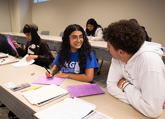 students chatting summer programs