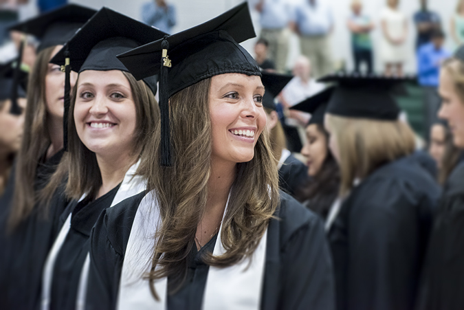 Female graduates at commencement