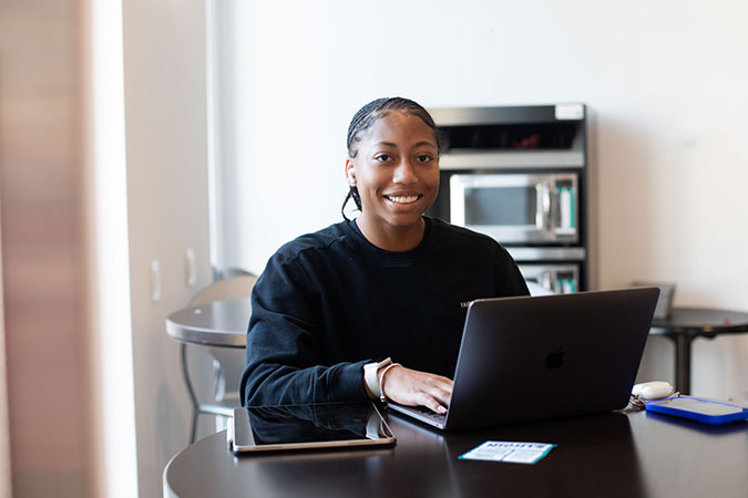 student on her laptop