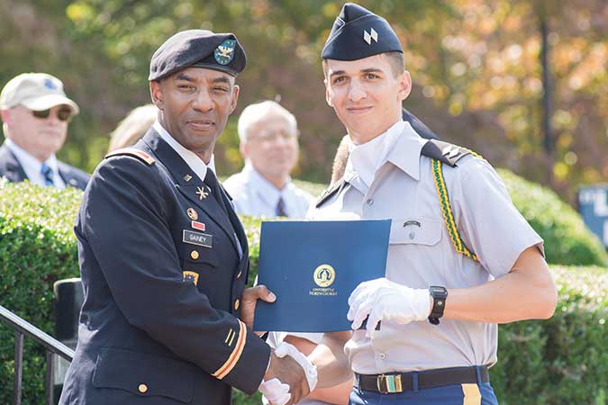 Cadet receiving an award from on office on the UNG campus