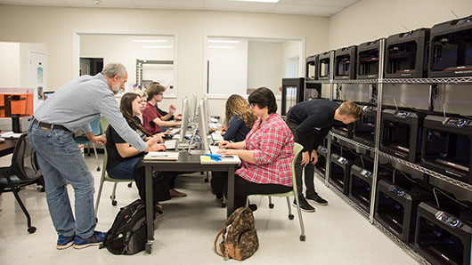 people working in a computer lab