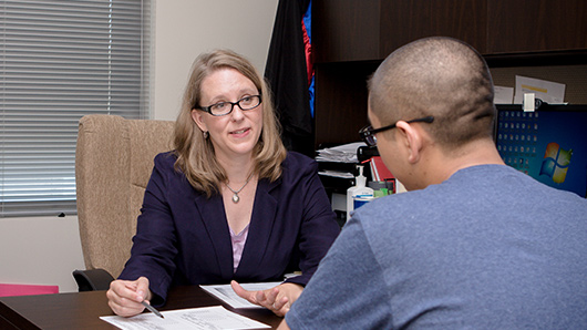 student meeting with academic advisor