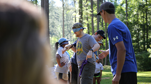 students learn leadership skills on the ropes course at Pine Valley