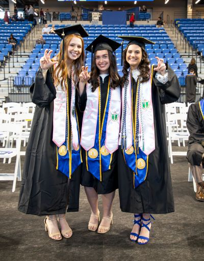 three sorority sisters at commencement
