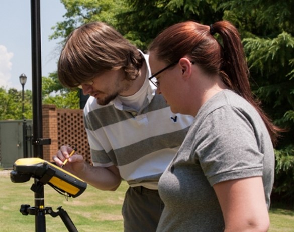Students use a geospatial surveying tool.