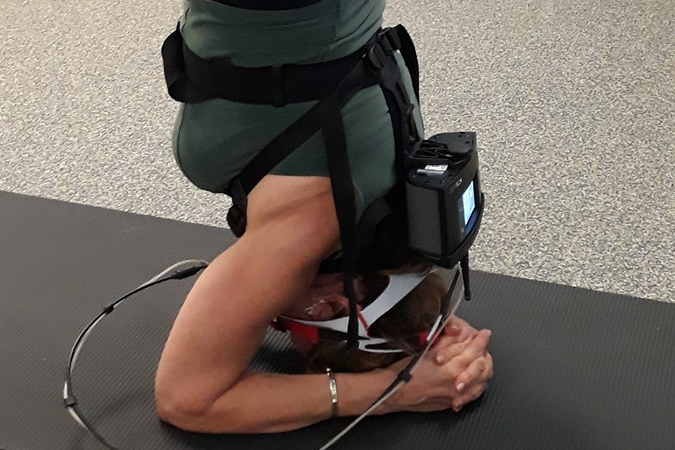 Dr. Paula Seffens demonstrating a yoga pose