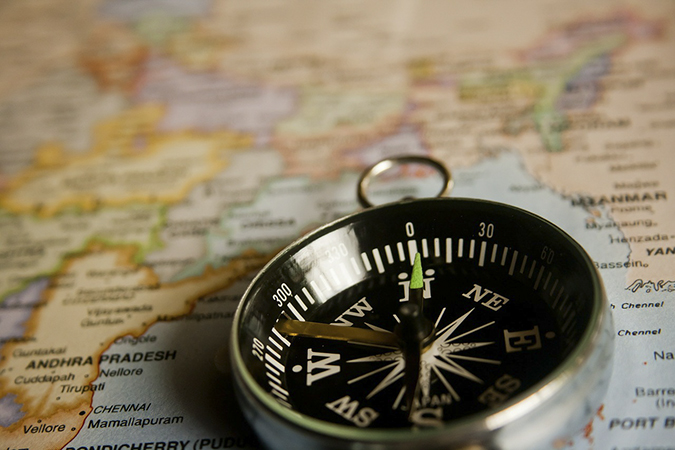 Compass and map. Go to Directions and Maps.