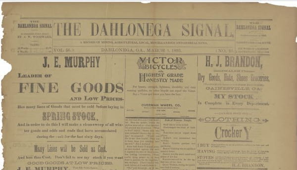 1895 Newspaper: The Dahlonega Signal. Showing advertisements with a Transatlantic-like grammar.