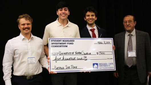 UNG Students accepting check for portfolio 2nd place competition.