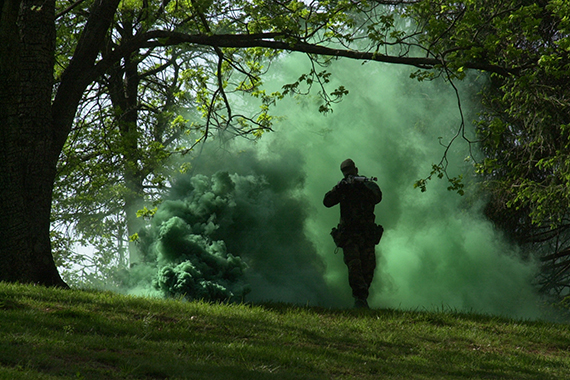 Cadet running through smoke