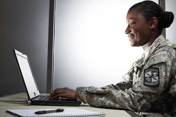 female cadet on laptop