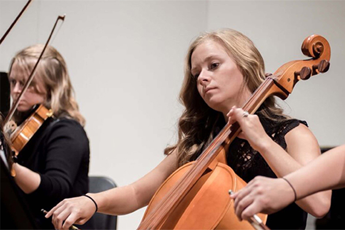 Cellists playing