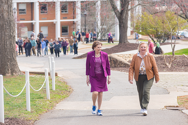 UNG President Bonita Jacobs (left) leads the Kick-off Walk along with Beth Arbuthnot (right) on UNG's Dahlonega Campus.