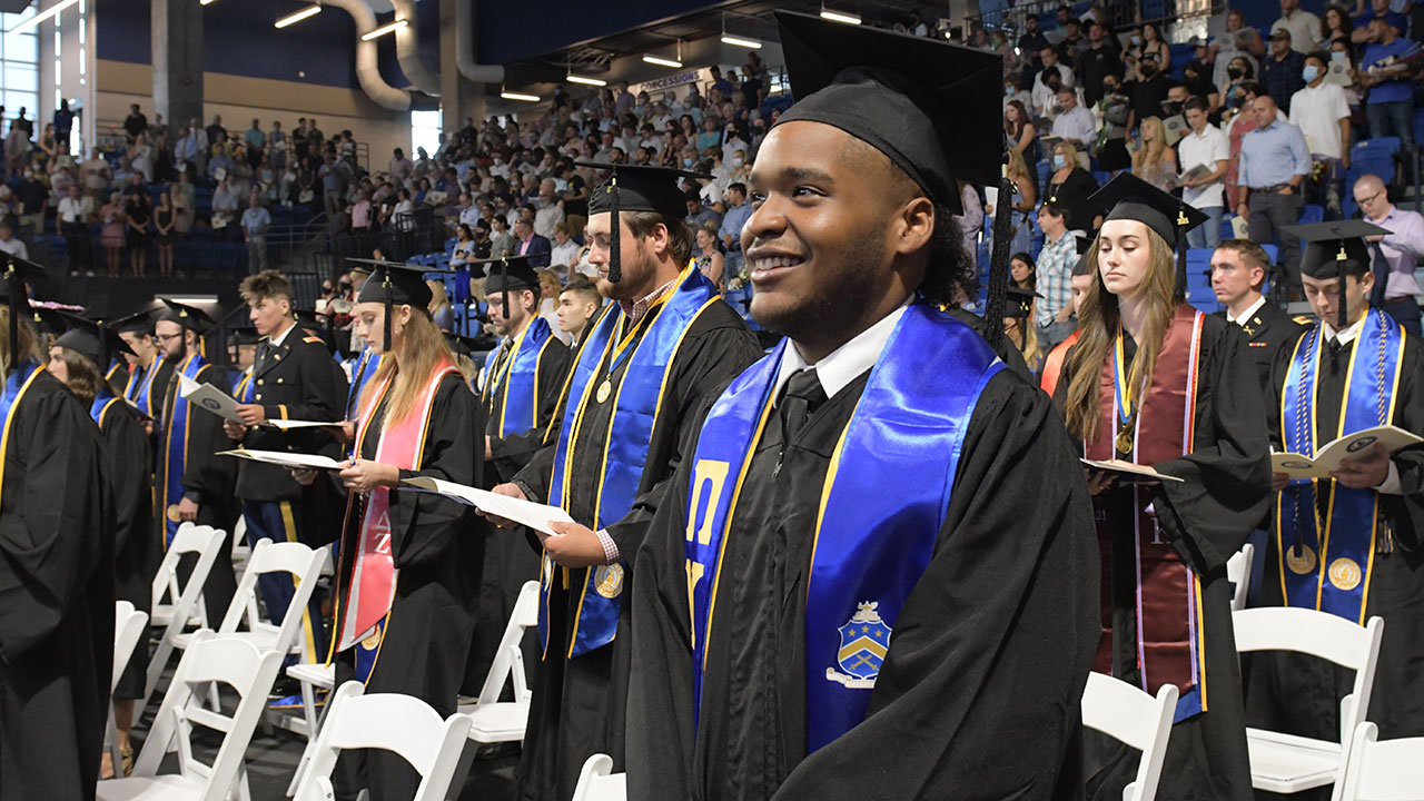 Graduates cheer on  traditional ceremony