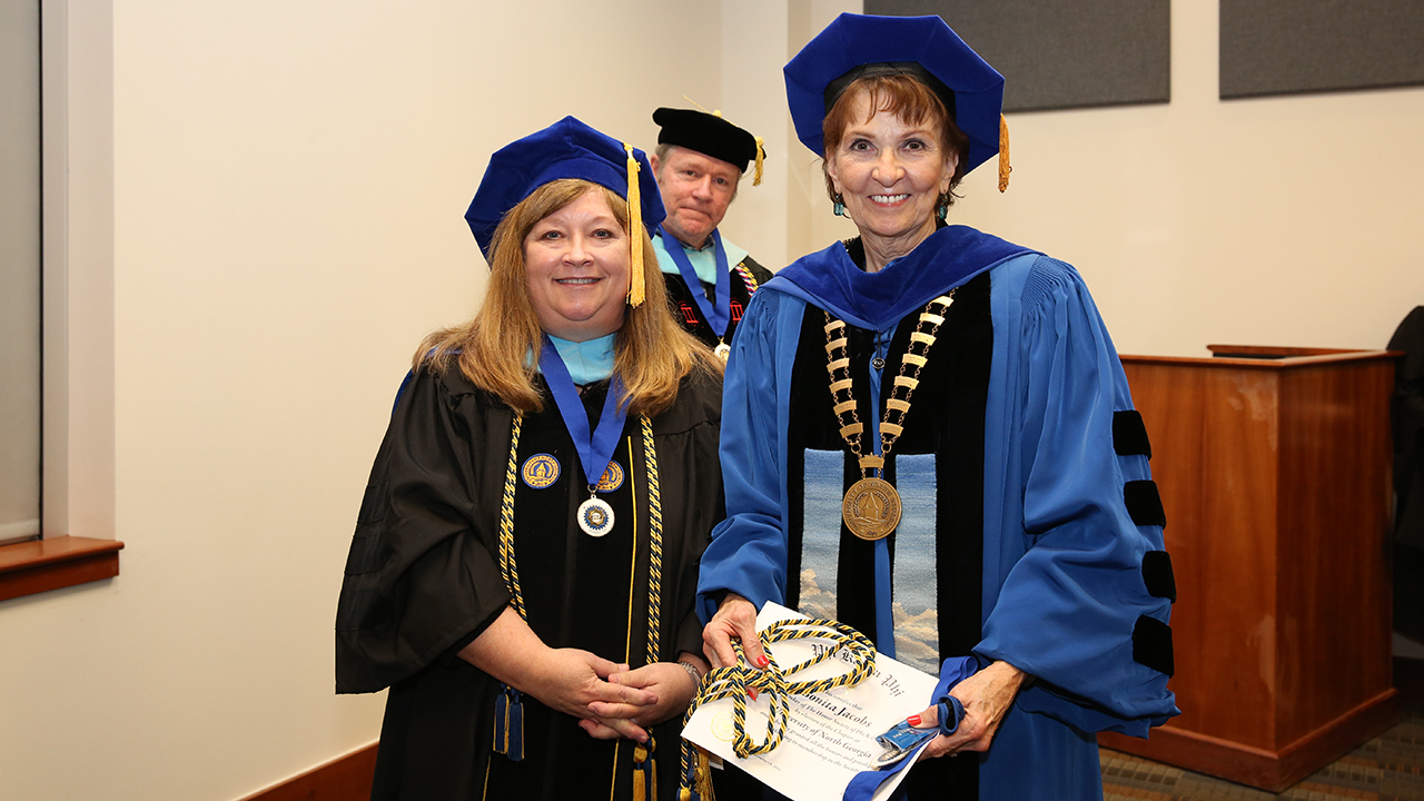 President and 26 others inducted into Phi Kappa Phi 