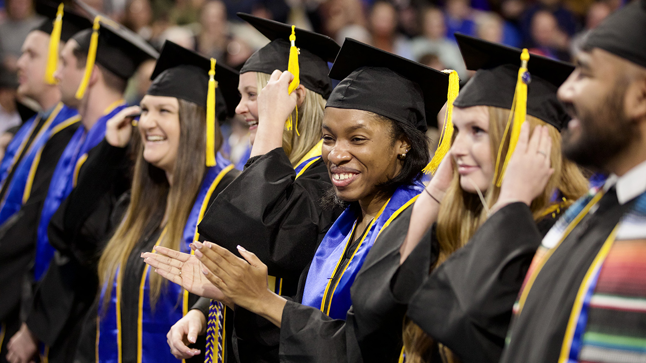 600 grads honored at fall commencement