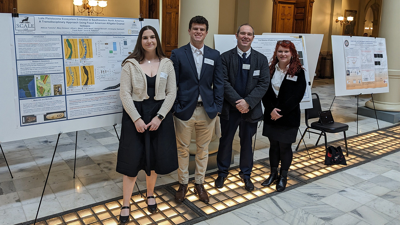 Three students  present at Capitol 