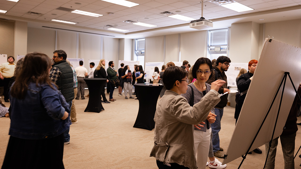 100 students present  research at conference