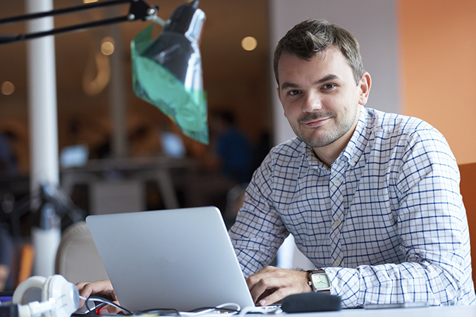 Student at a desk with computer