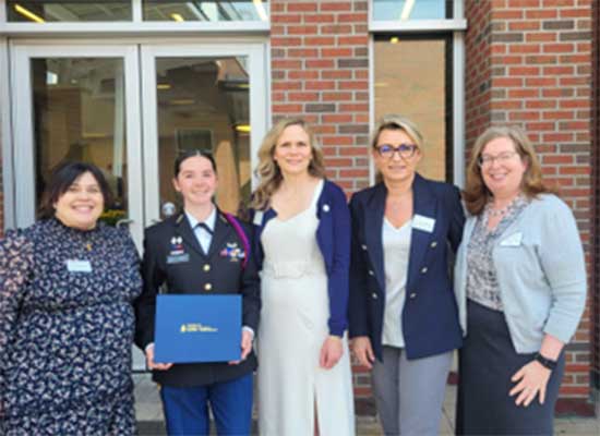 (Olivia Sullens, second to the left, commemorates the event with fellow UNG leaders