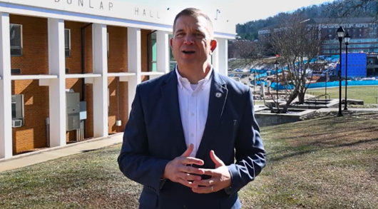 President Shannon outside Dunlap Hall giving his January Wrap Up