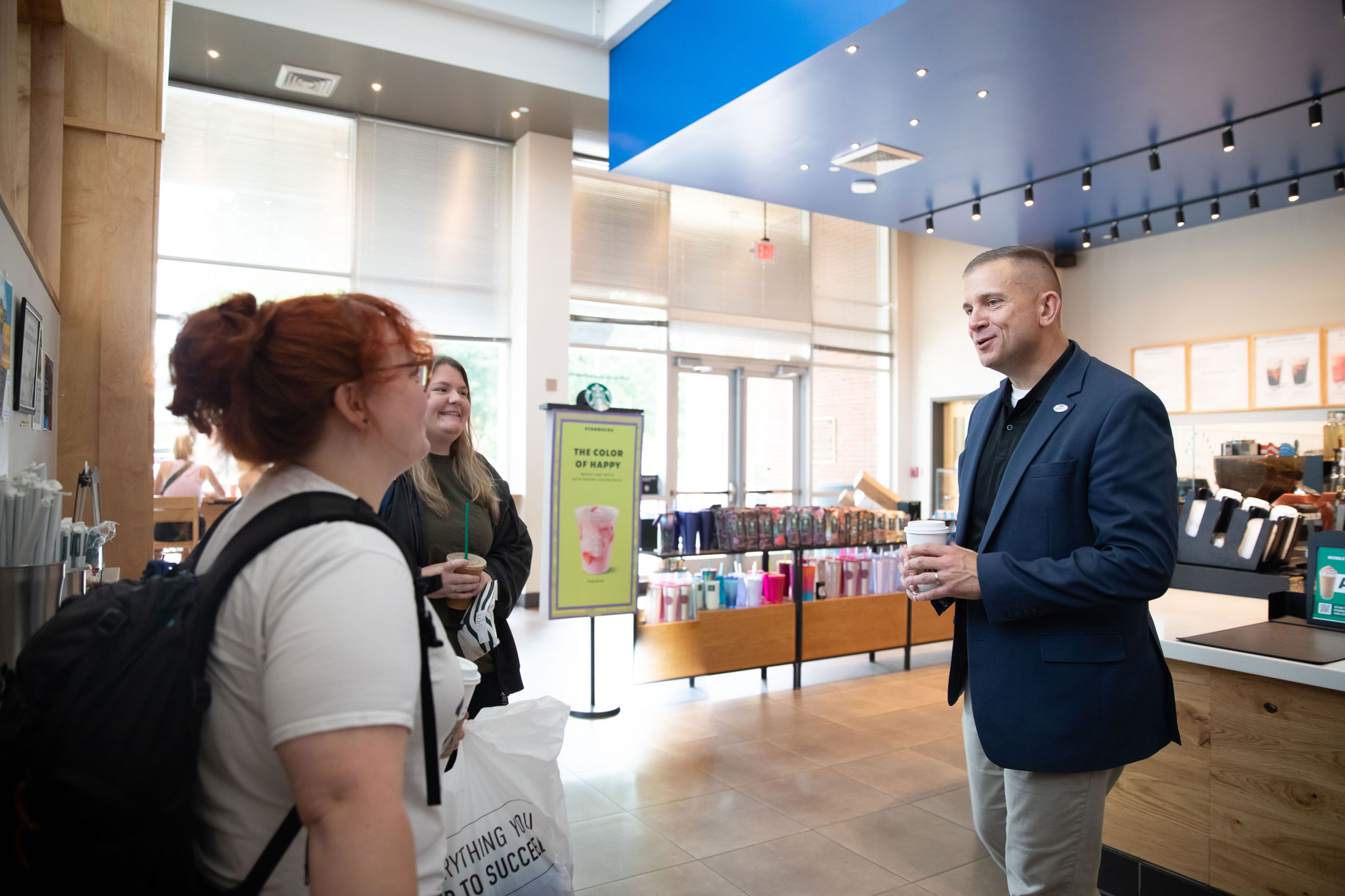 President Shannon talking with students