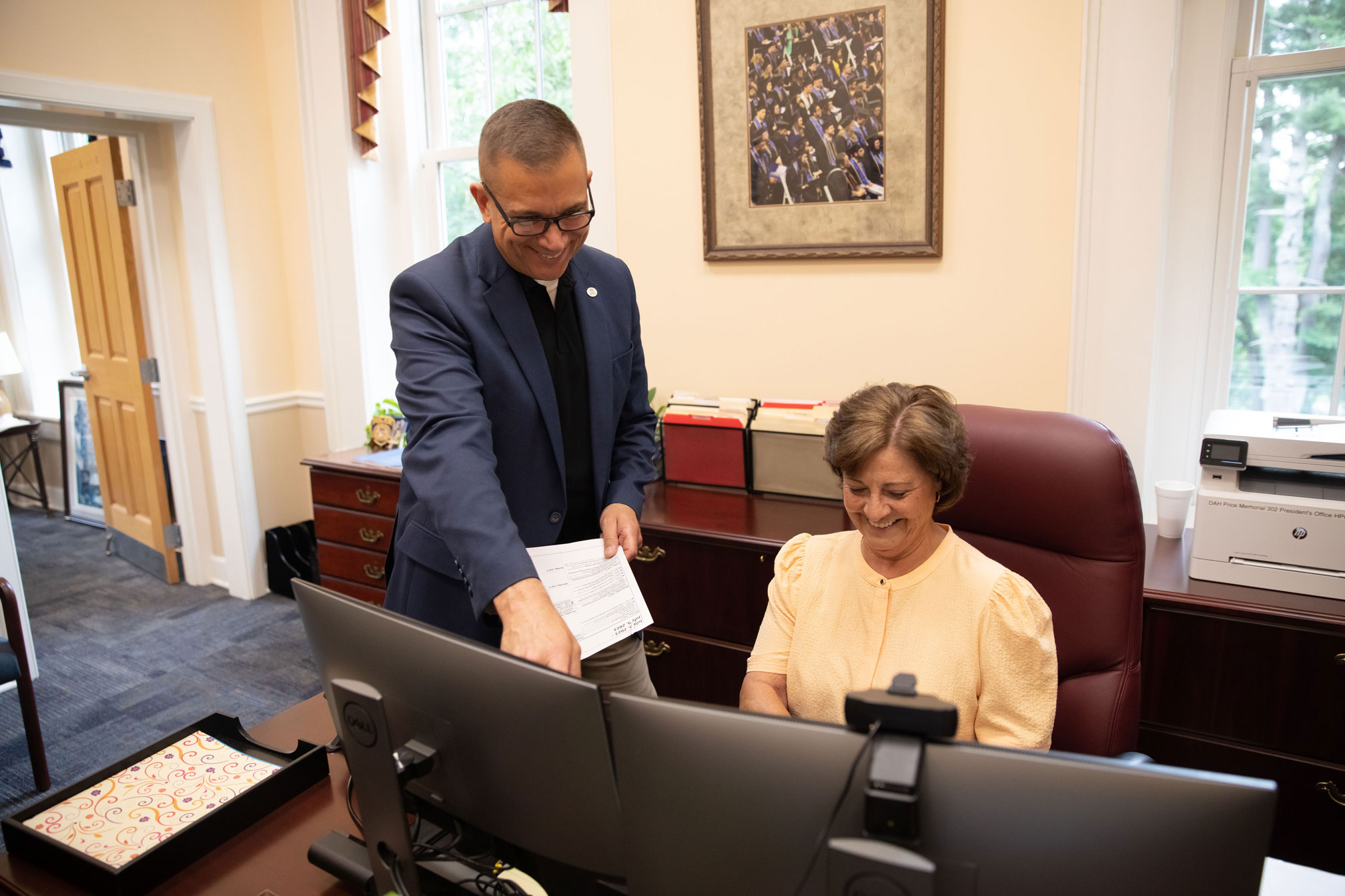 President Shannon with an office administror